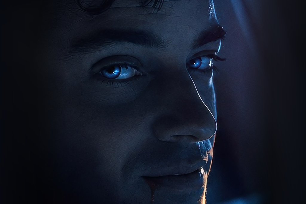 Close-up from the RYDE poster of a man's face lit in cold blue, with glowing eyes and a line of blood at the corner of his mouth