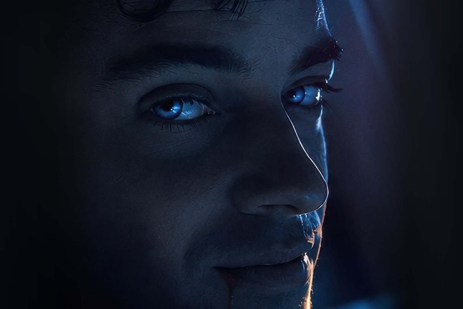 Close-up from the RYDE poster of a man's face lit in cold blue, with glowing eyes and a line of blood at the corner of his mouth