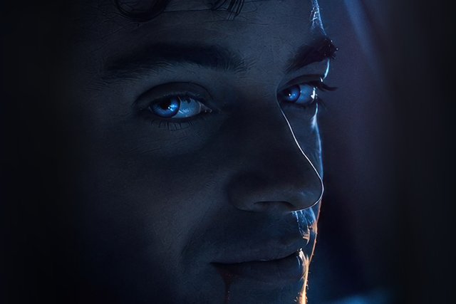 Close-up from the RYDE poster of a man's face lit in cold blue, with glowing eyes and a line of blood at the corner of his mouth